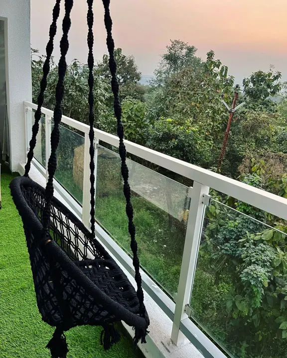 Swing chair on the long balcony